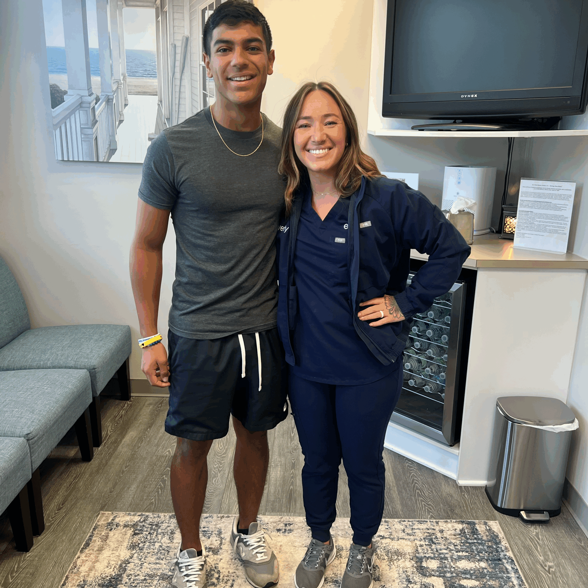 evenly dental technician and patient smiling