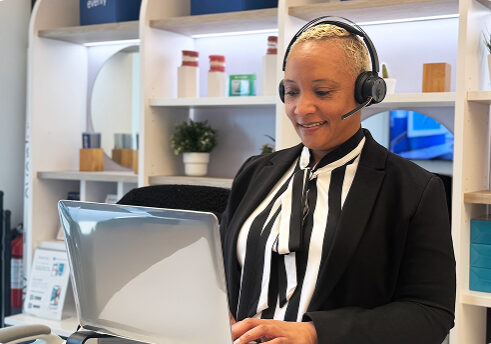 gettyimages-473498656-170667a 2 dentist receptionist on computer with phone headset